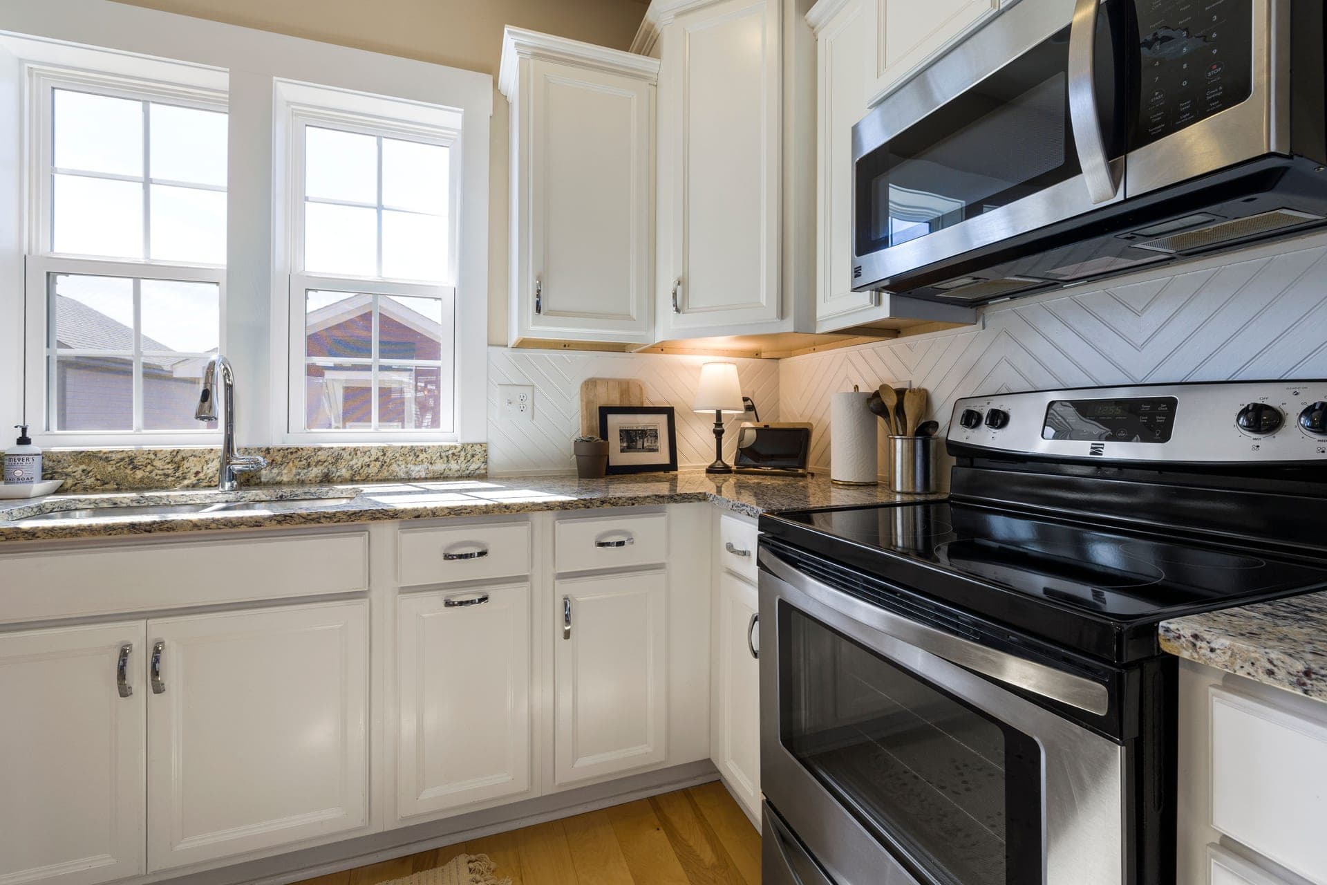 A bright modern kitchen with stainless steel appliances
